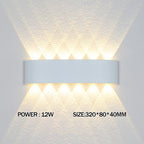 Wall-mounted light fixture with power and size specifications on a gray background