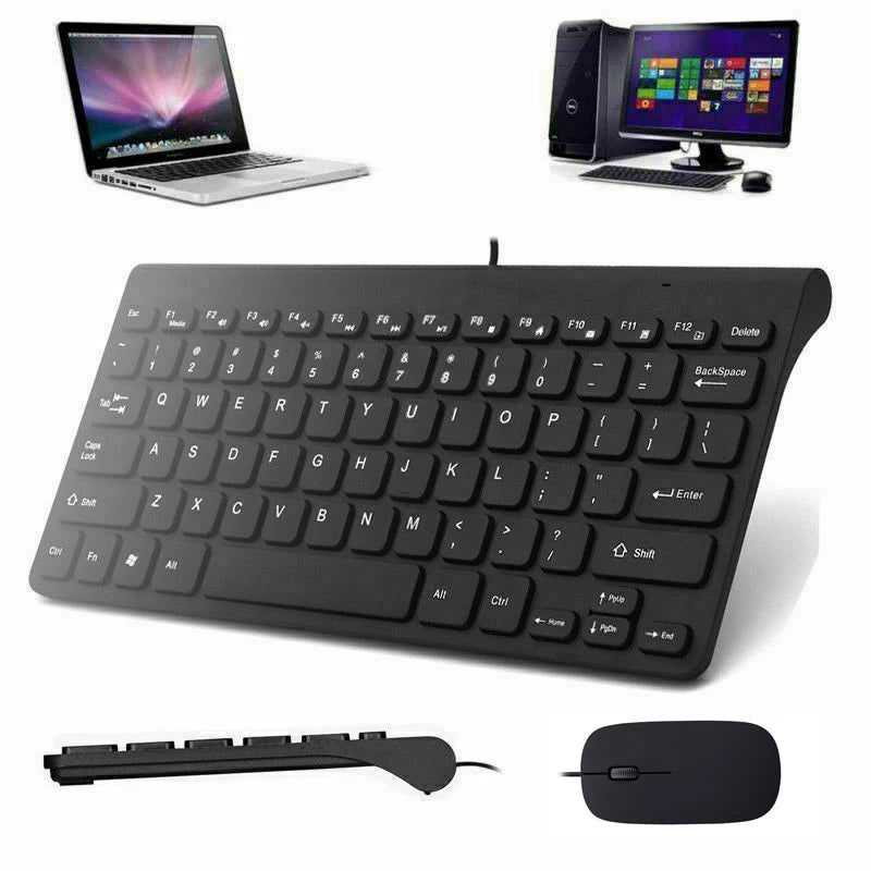 Black keyboard with mouse and laptop on a white background