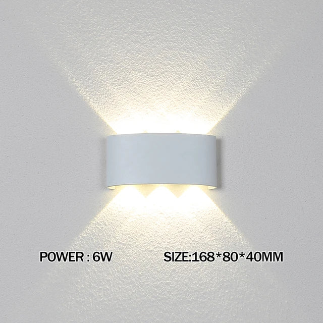 Wall-mounted light fixture on a textured wall with power and size information displayed.