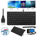Black keyboard with USB cable on a white background, showing compatibility with Windows and Mac operating systems.