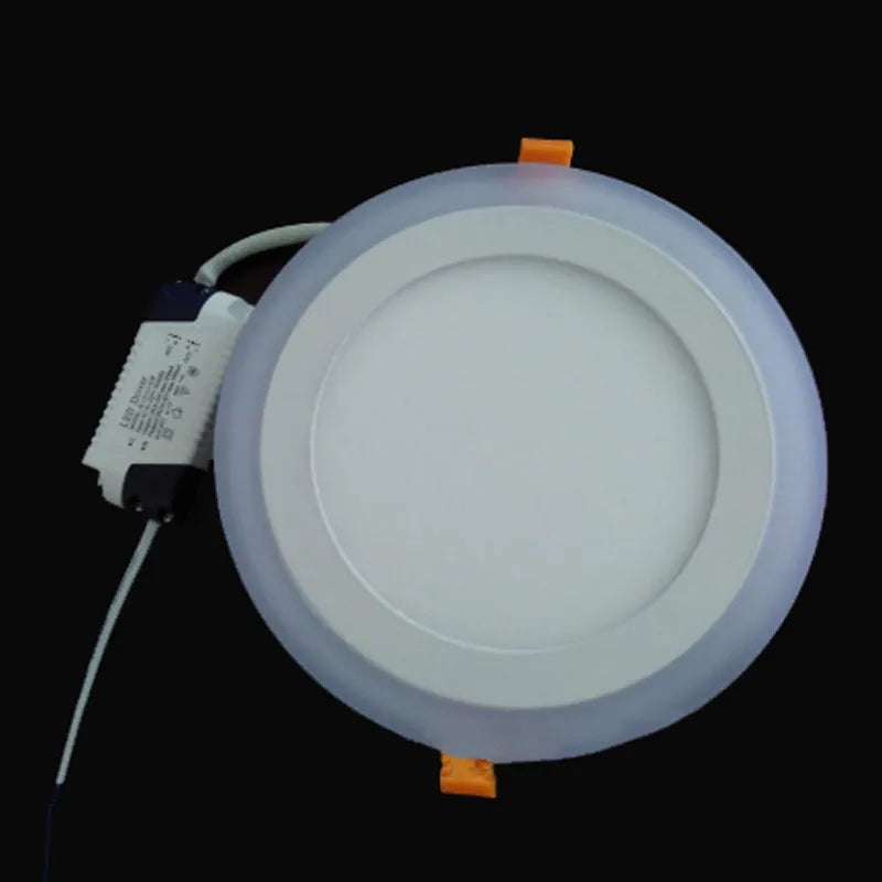 Round LED downlight with visible wiring on a black background