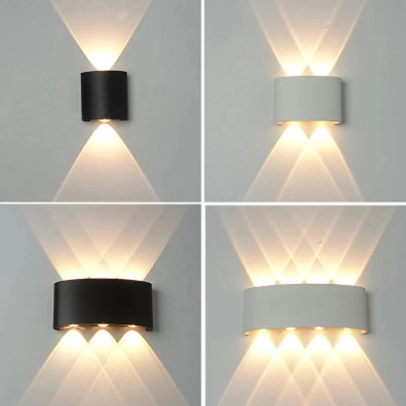 Four wall lights in black and white on a gray background