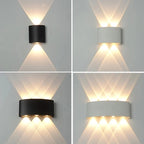 Four wall lights in black and white on a gray background