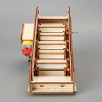 Wooden mechanical model on a gray background