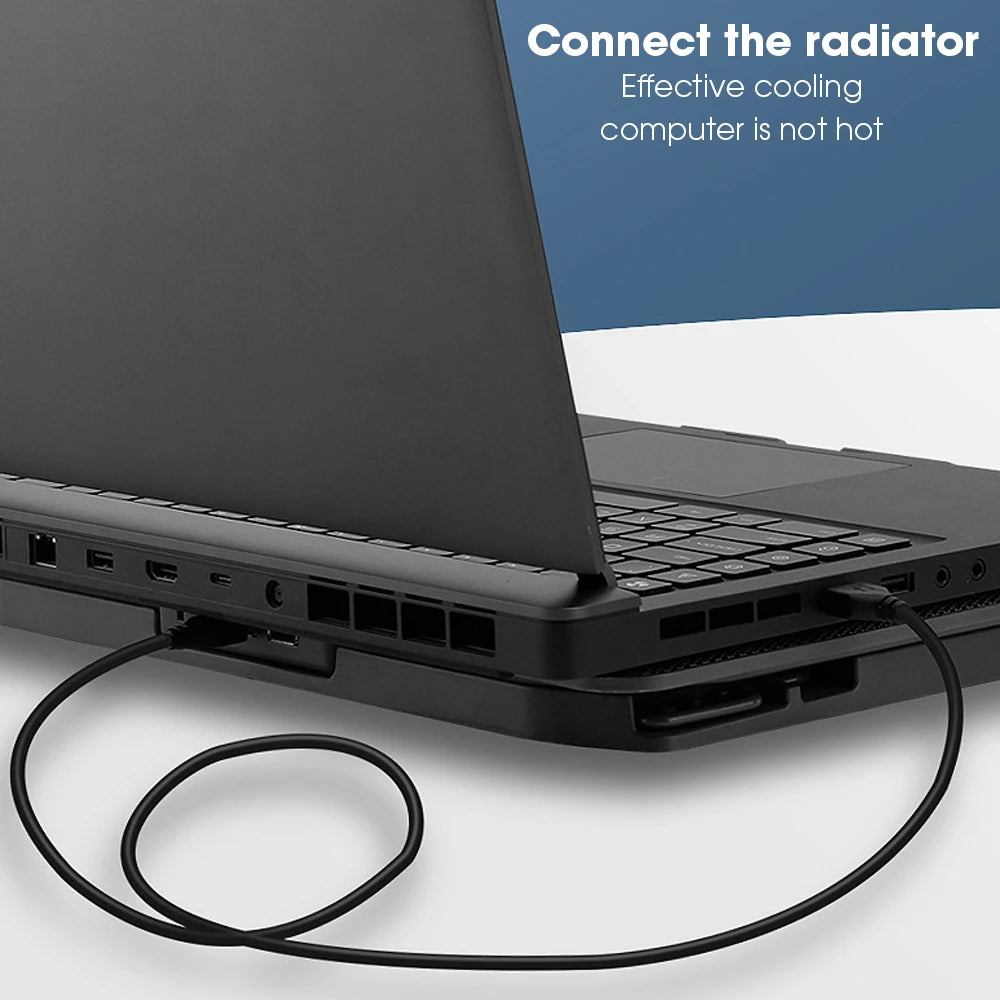 Laptop with a cooling pad on a white surface, with text indicating effective cooling.