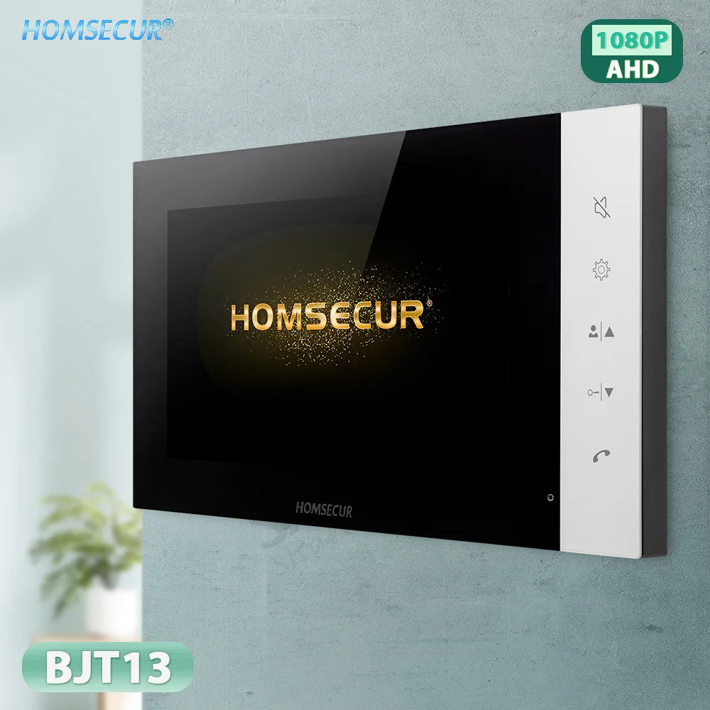 A HOMSECUR indoor video intercom receiver wall mount, model BJT13, featuring a black glossy screen with gold HOMSECUR lettering and a white control panel on the right side, mounted on a textured light gray wall.