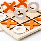 Wooden tic-tac-toe game with orange 'X' and white 'O' pieces on a light background