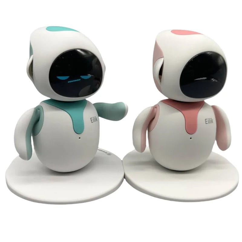 Two small robot toys with different colored accents on a white background