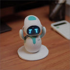 Small robot toy on a wooden surface with a blurred background