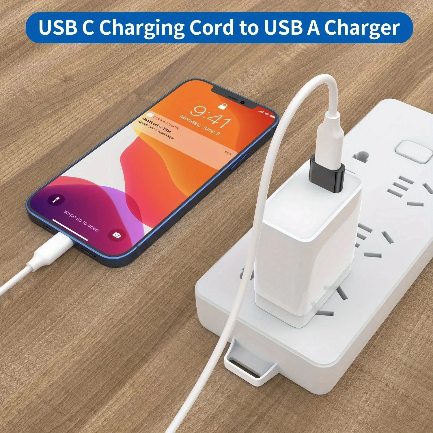Phone charging via USB-C to USB-A cable on a wooden surface