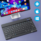 Black keyboard in front of a monitor with app icons on a purple background