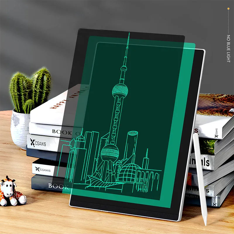 Tablet with a green screen displaying a cityscape on a wooden surface with books and a plant.