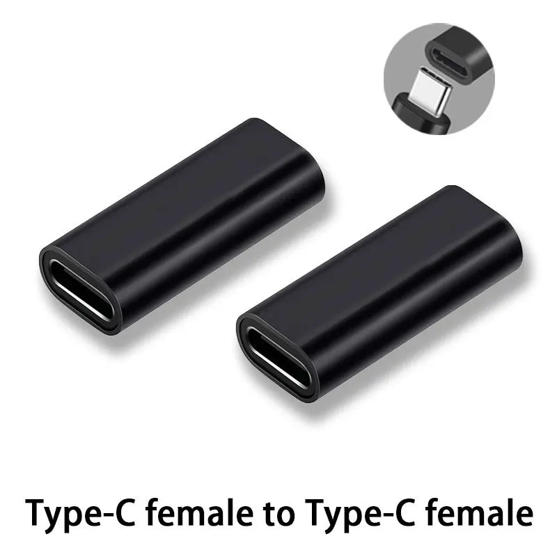 Two black Type-C female to Type-C female adapters on a white background.