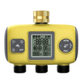 Yellow digital water timer with a gold cap on a white background