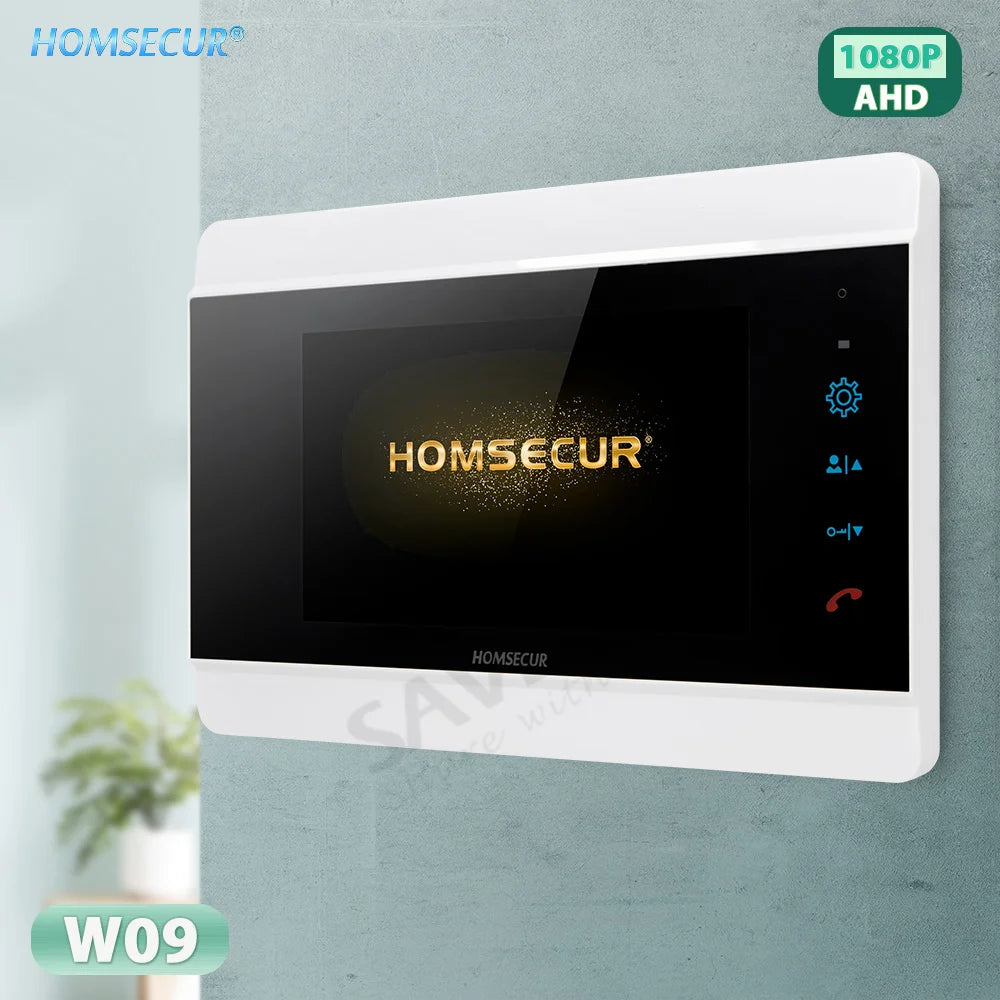 A HOMSECUR video intercom receiver with a white frame and a glossy black screen, mounted on a textured light gray wall. The screen displays the HOMSECUR logo in gold with a sparkling effect, and the right side shows blue and red icons for settings, camera, and phone.