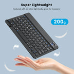 Lightweight keyboard with a hand holding it, on a light blue background