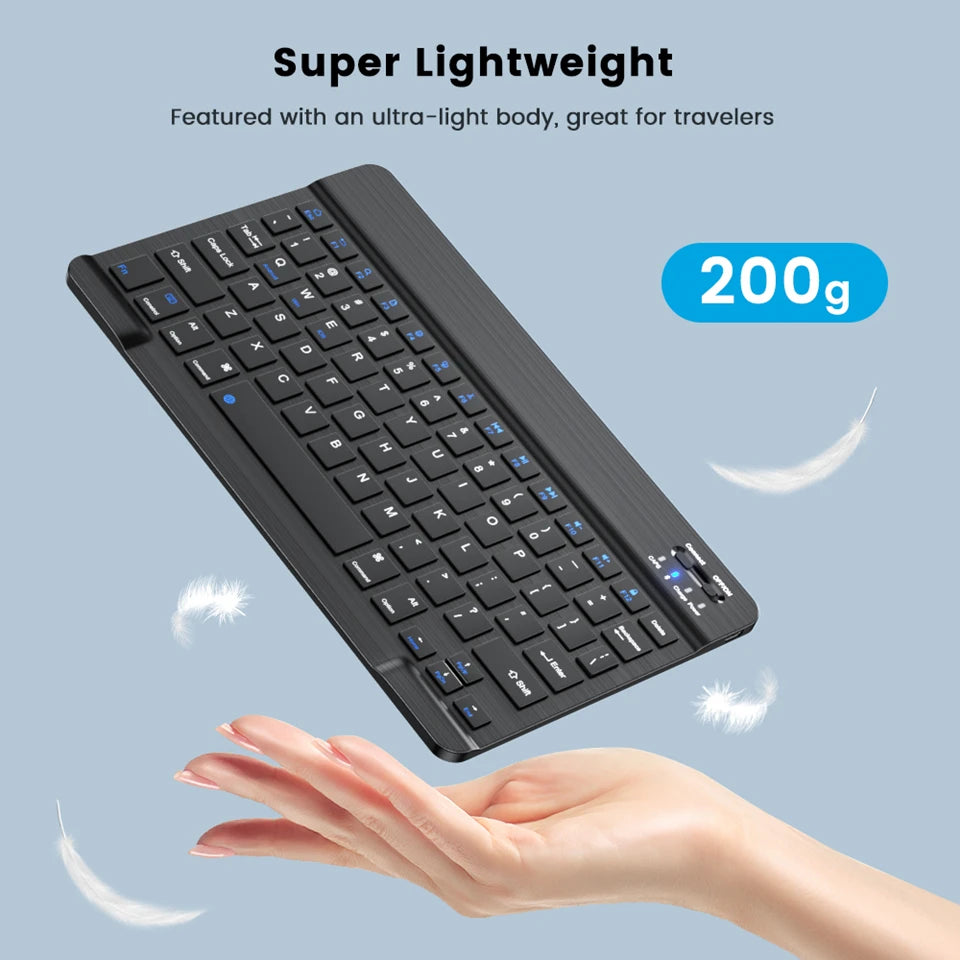 Lightweight keyboard with a hand holding it, on a light blue background